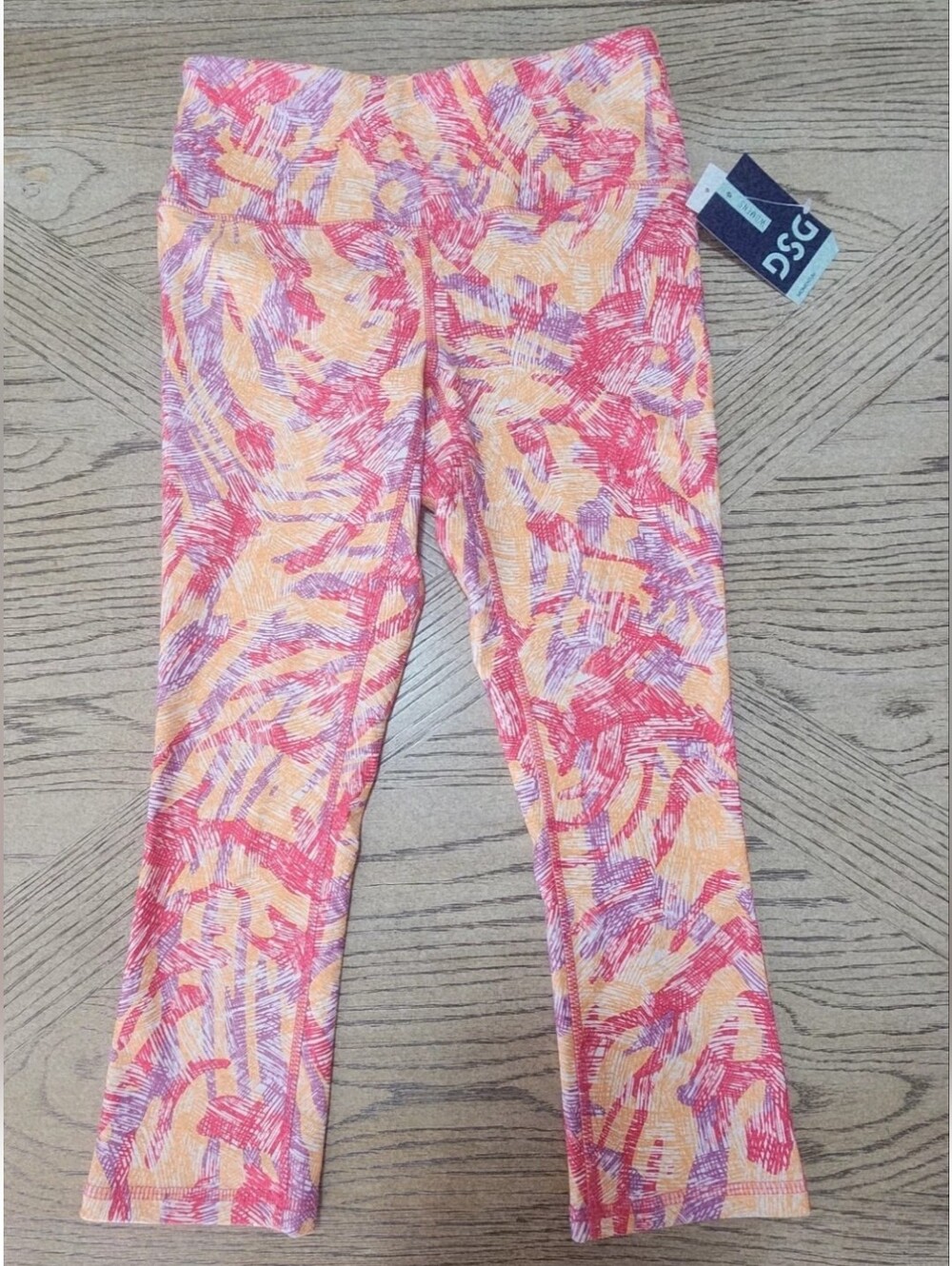 DSG NWT Momentum Womens High Rise Capri Leggings Abstract Zebra Tangerine XS